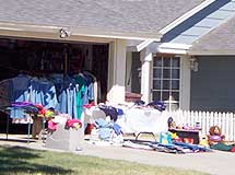 Yardsale in front of a house.