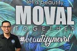 Mayor Gutierrez in front of the Beautify MoVal banner.