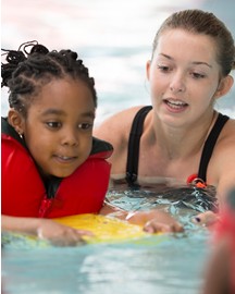 Woman and child in pool